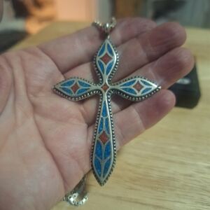 Elegant Silver Cross Necklace with Blue and Red Accents